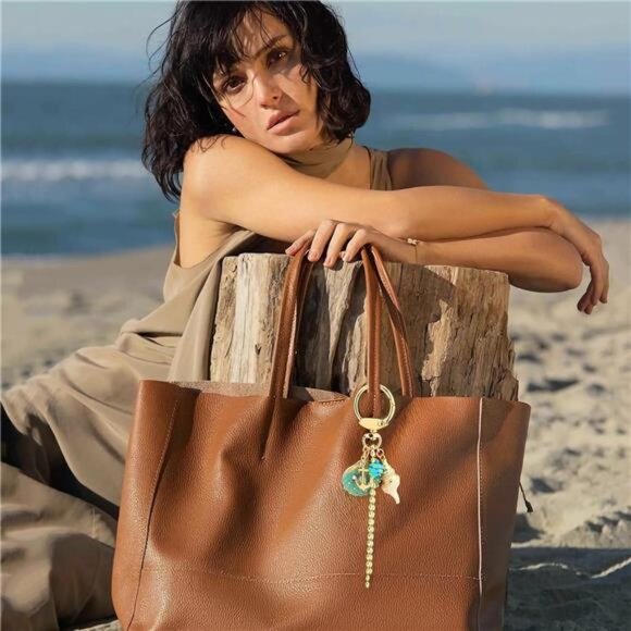 Ocean-Inspired Gold Keychain. - Picture 3 of 5